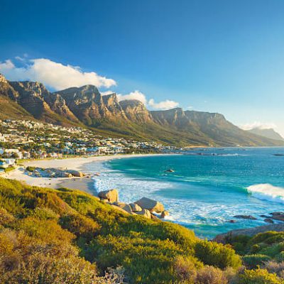 Beach and Twelve Apostles mountain in Camps Bay near Cape Town in South Africa.